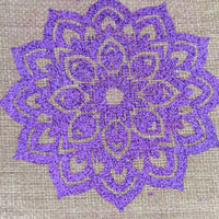 Close-up of a purple mandala pattern on a hessian bag for Diwali celebrations, showcasing festive charm.