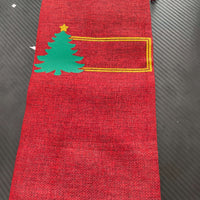 Personalised red hessian wine bottle bag with green Christmas tree and space for a name or message.