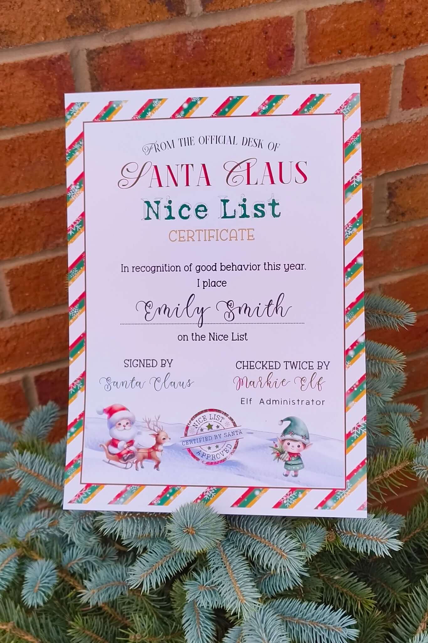 Santa Claus Nice List certificate with festive border, elf and reindeer illustration, signed by Santa and Elf Administrator, personalised with child’s name for Christmas keepsake.