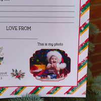 Personalised Christmas Eve box set with photo of child in festive hat and Christmas presents.