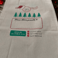 Personalised Santa sack for kids featuring holiday graphics and space for a name, perfect for Christmas gift giving.