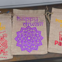 Personalised hessian bags for Diwali featuring intricate designs and festive messages. Perfect for gifts and party favours.