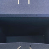 Top view inside navy Ganesh gift box showing slots for ribbon closure, handmade for Hindu celebrations and festive gifting.